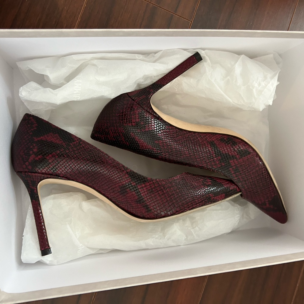 Jimmy Choo heels
basically new - only work a few times 
size 6